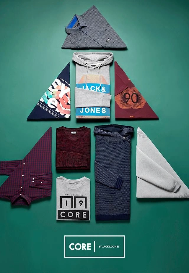 Christmas creative ad: Folded clothes arranged into a Christmas tree