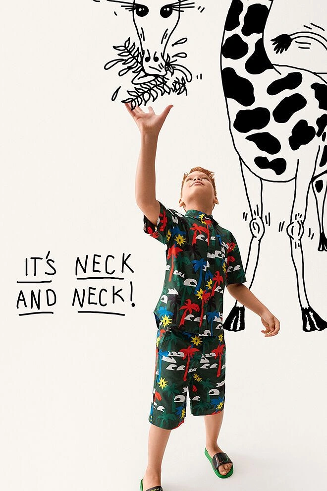 Kids Clothing creative ad: 'Neck and neck' giraffe doodle pun