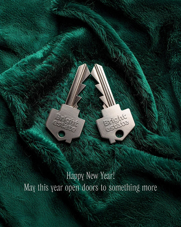 New Year creative ad: Two branded silver keys forming a Christmas-tree silhouette