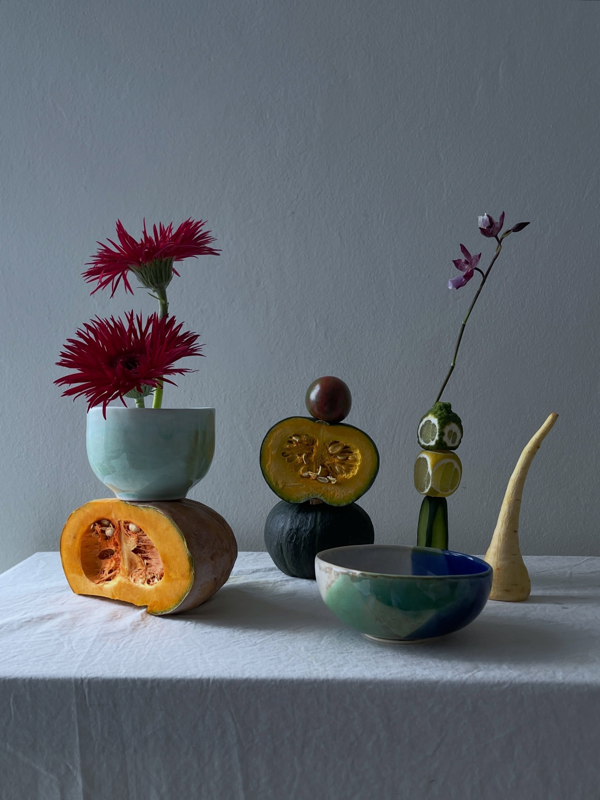 Carousel: An art-directed still life of fruit, flowers, and sculptural ceramic objects, slide 4