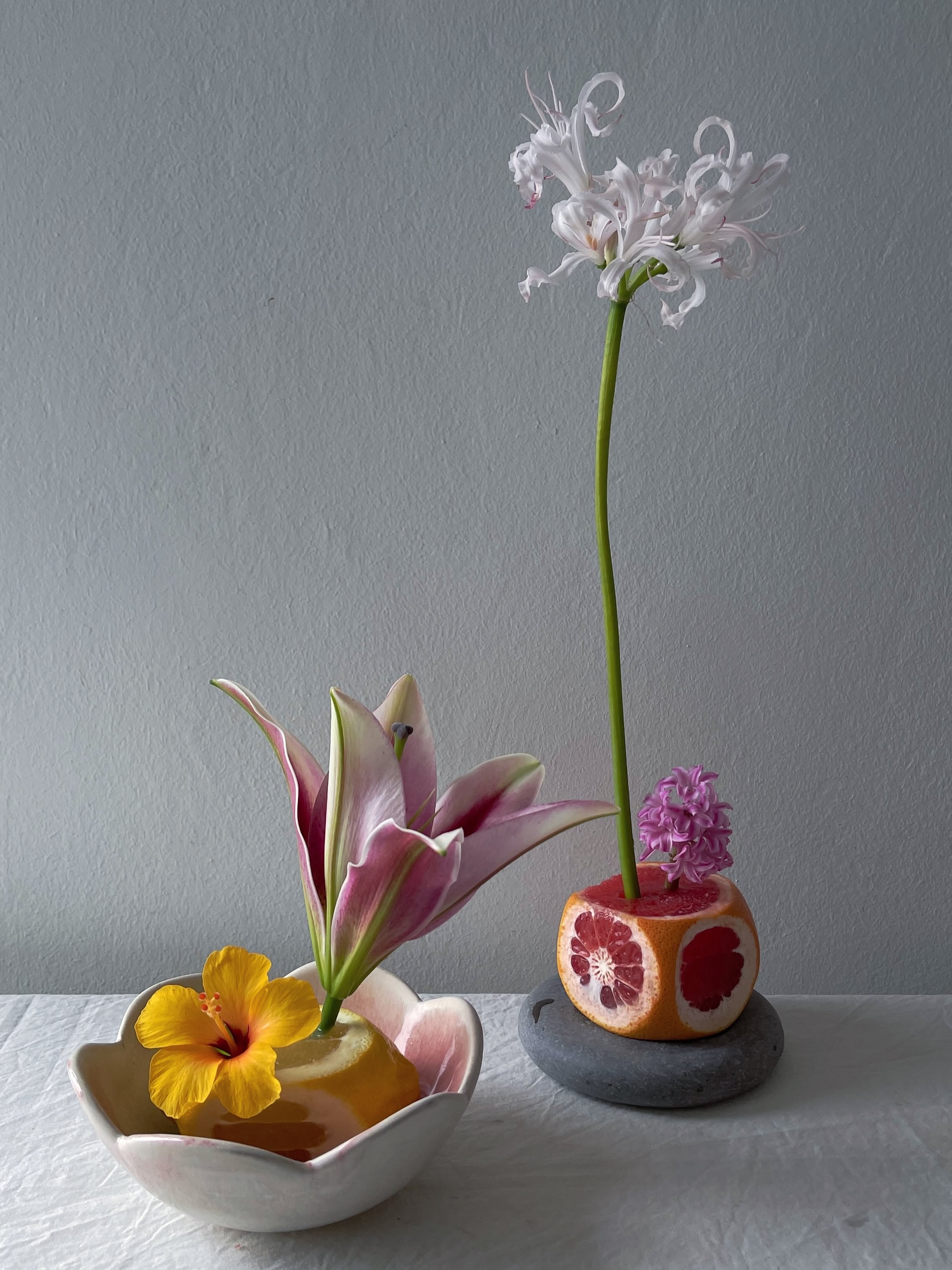 Carousel: An art-directed still life of fruit, flowers, and sculptural ceramic objects, slide 5