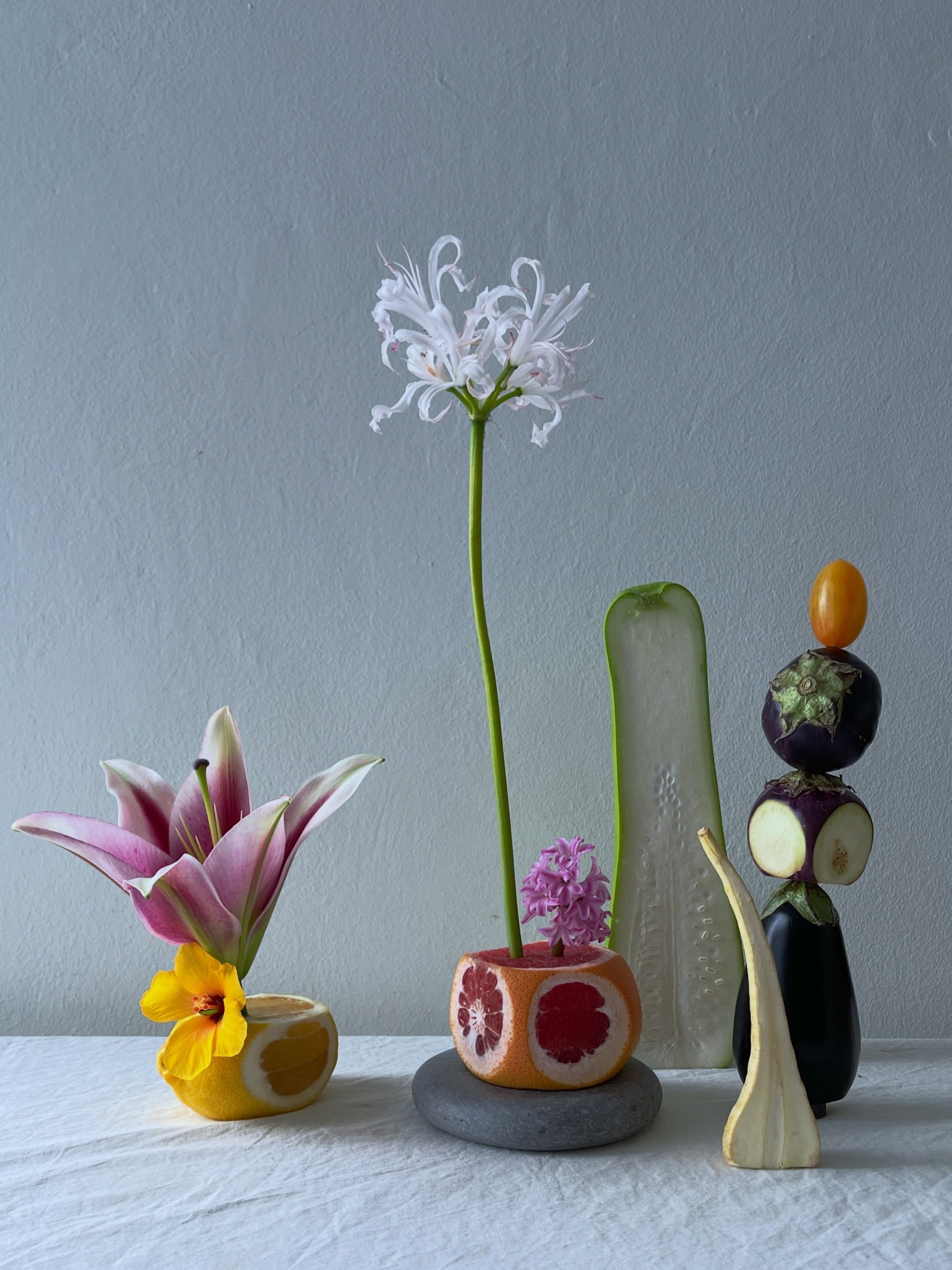 Carousel: An art-directed still life of fruit, flowers, and sculptural ceramic objects, slide 7