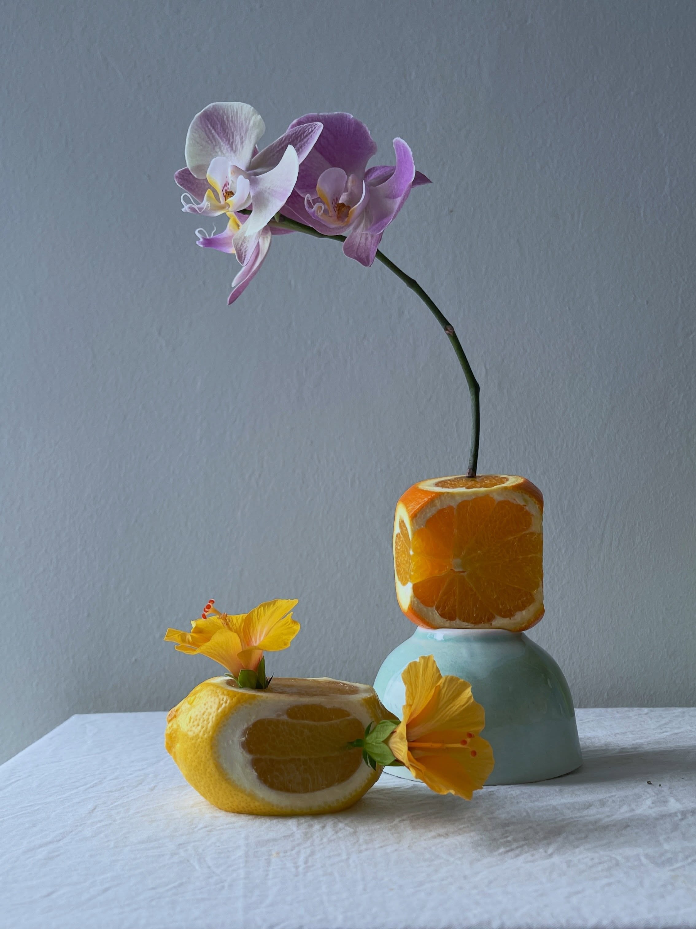 Carousel: An art-directed still life of fruit, flowers, and sculptural ceramic objects, slide 8