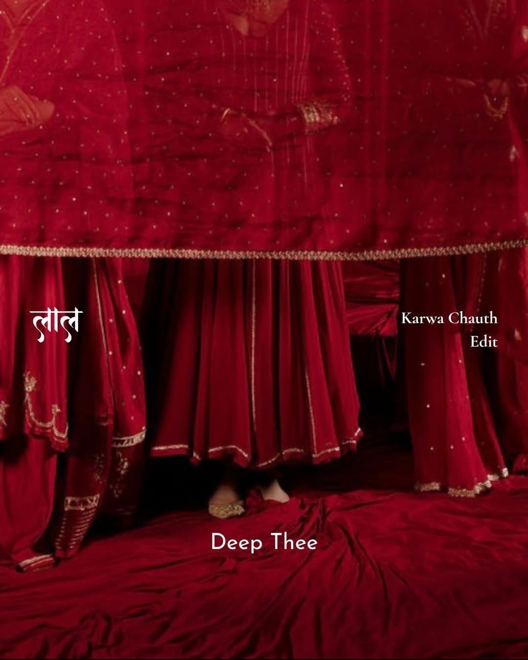 Women in red anarkalis draped under a sheer red dupatta canopy