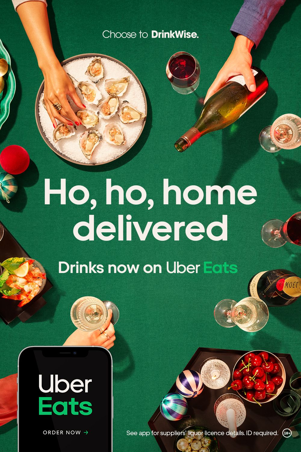 Christmas Poster: Top-down holiday party table with drinks and hands