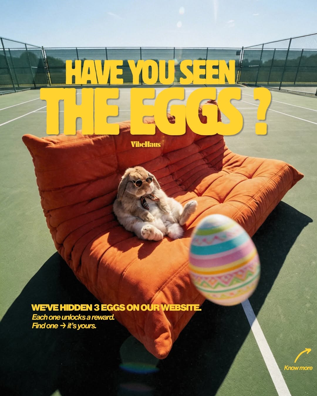 Bunny in sunglasses lounging on an orange sofa on a tennis court