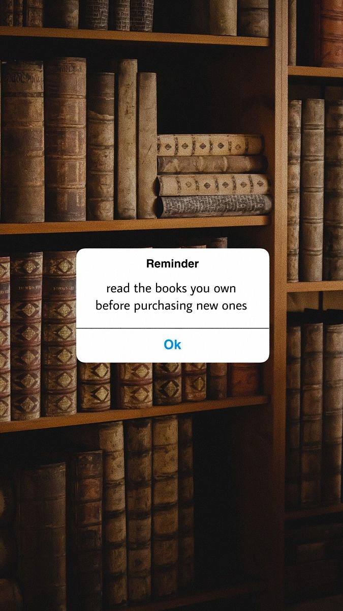 Bookstores creative ad: Phone reminder pop-up over bookshelf, witty