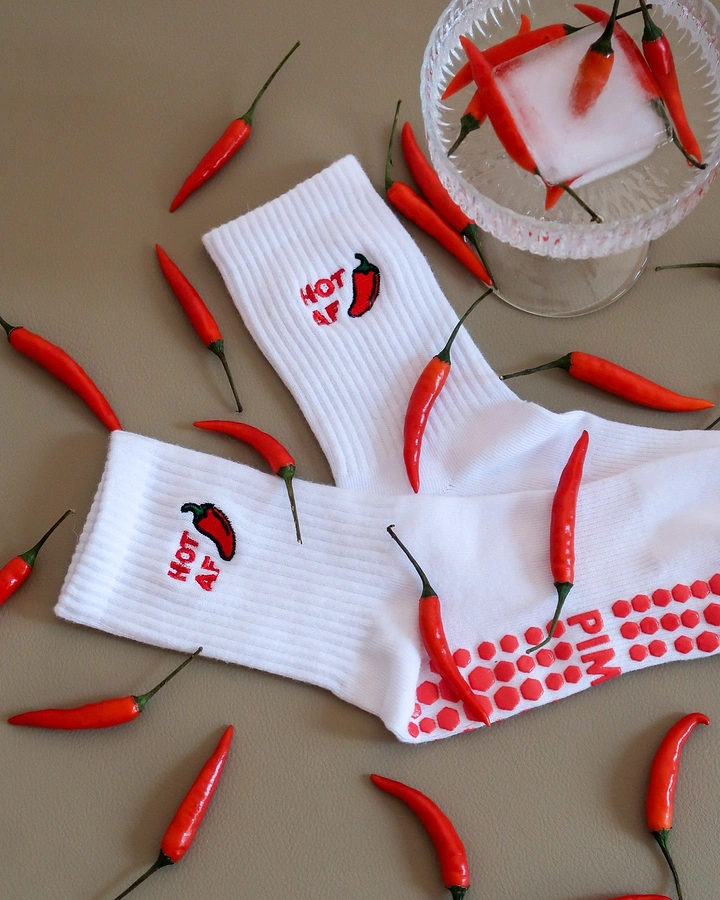 Socks Brands creative ad: Chili peppers create hot-pink pun