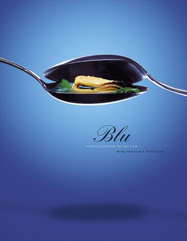 Poster: Two spoons nested like an open mussel shell holding seafood