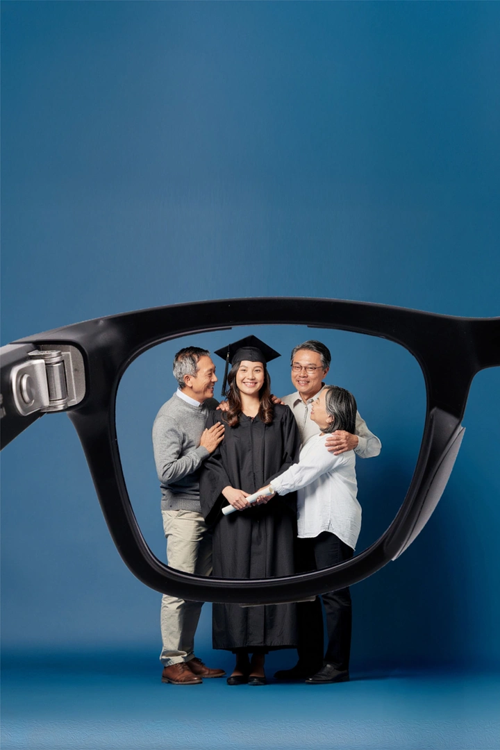 Opticians & Eye Care creative ad: Giant frame lens frames family graduation moment