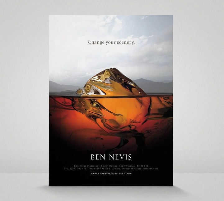 Creative ad: Ice cube in whisky that reads as a mountain peak on the horizon
