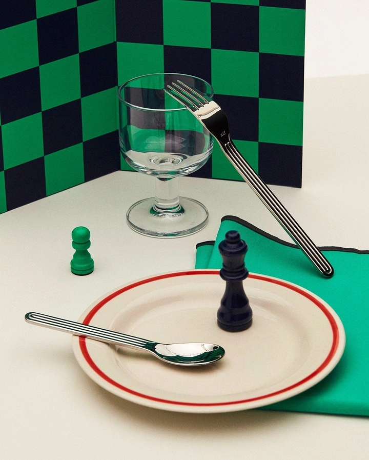 Tableware & Crockery creative ad: Chessboard plate setup creates witty product metaphor