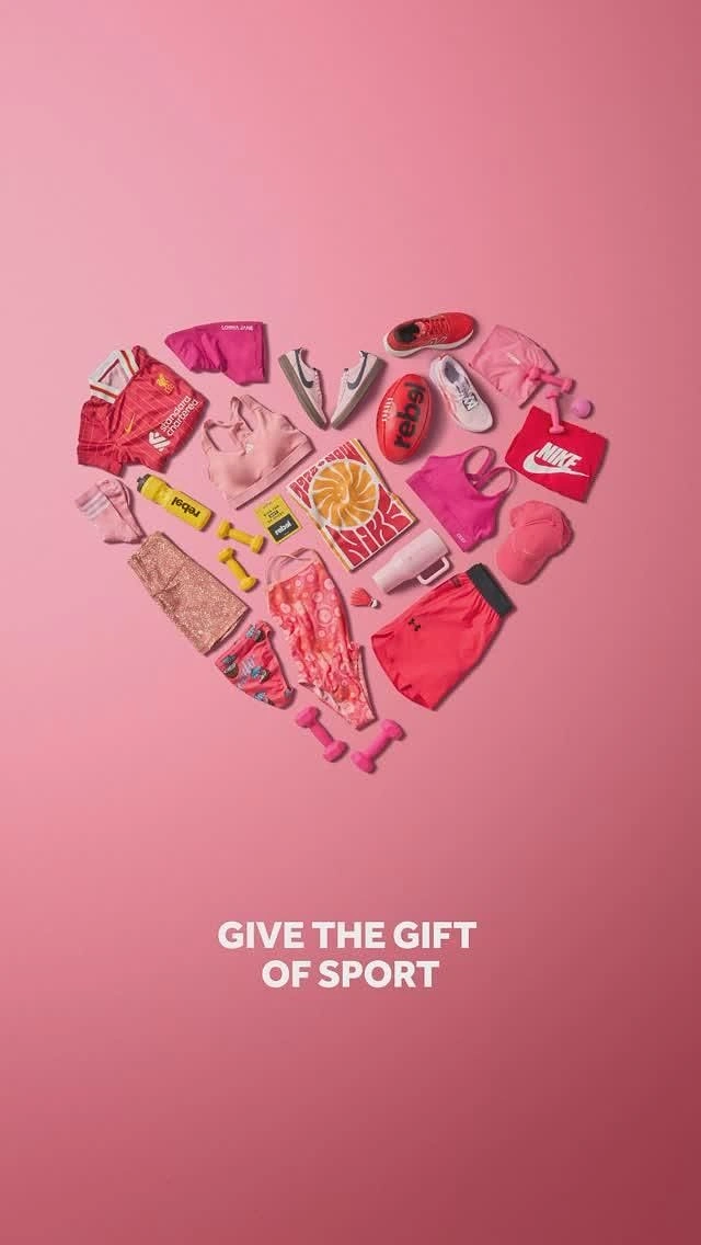 Valentine's Day creative ad: Heart shape made of pink and red sports gear