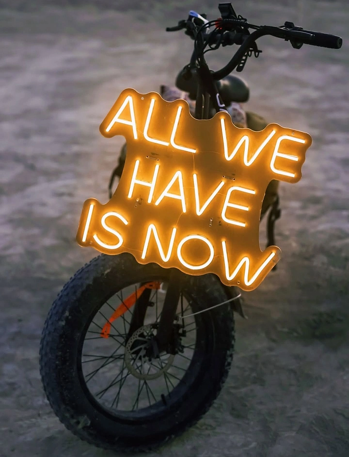 Signage & Sign Makers creative ad: Unexpected bicycle-mounted neon sign composition