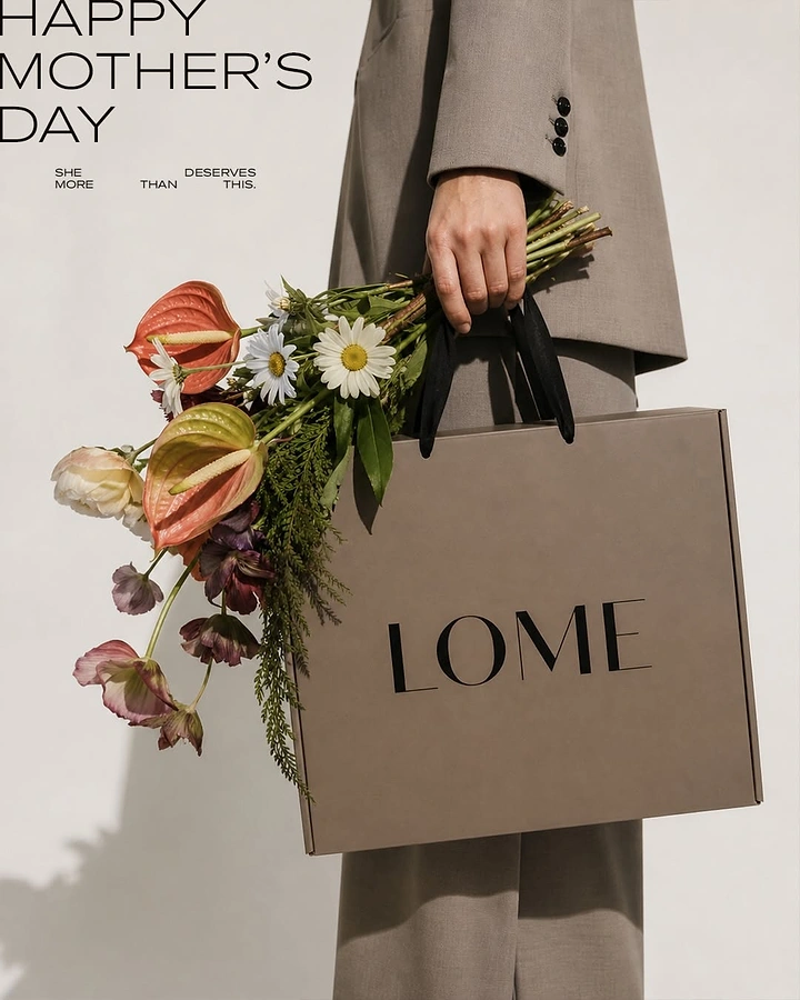 Mother's Day creative ad: Suited figure holding a branded shopping bag and a loose bouquet