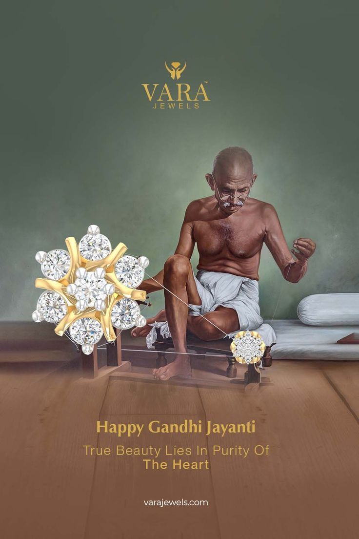 Painted Gandhi spinning a charkha with diamond jewellery as wheels
