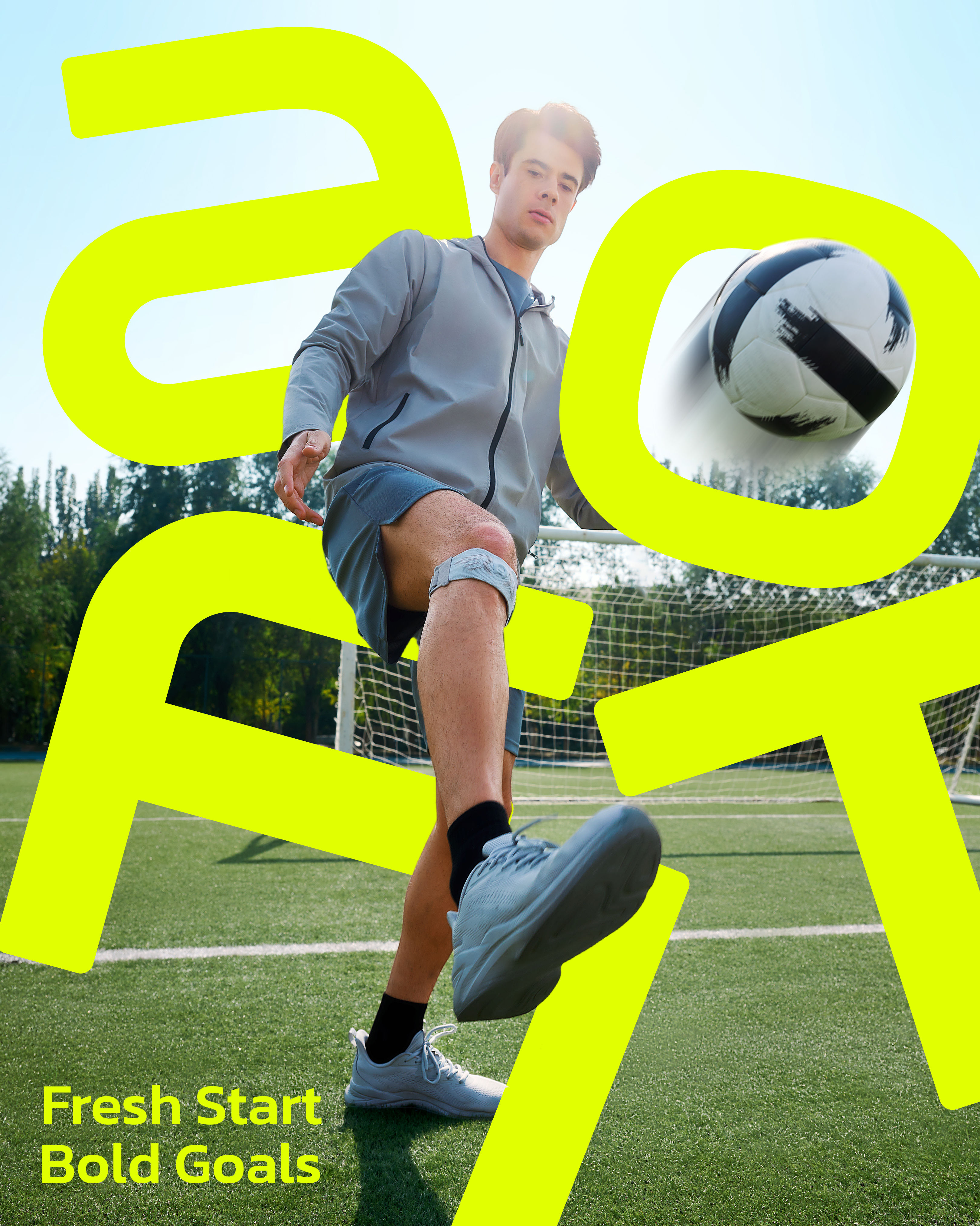 New Year Instagram post: Young man in grey activewear kicking a football toward the camera