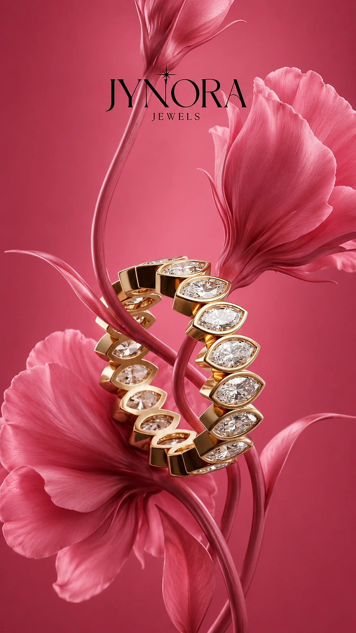 Creative ad: Gold marquise-diamond eternity band entwined with pink flower stems