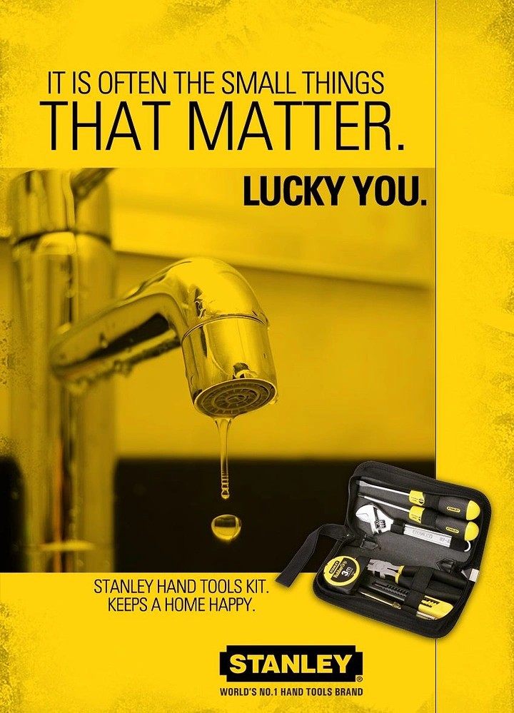 Plumbers creative ad: Leaking tap with a falling drop beside an open hand tool kit