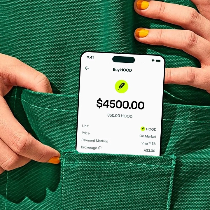 Stock Brokers & Investing creative ad: Phone with stock-buy screen tucked in green canvas pocket