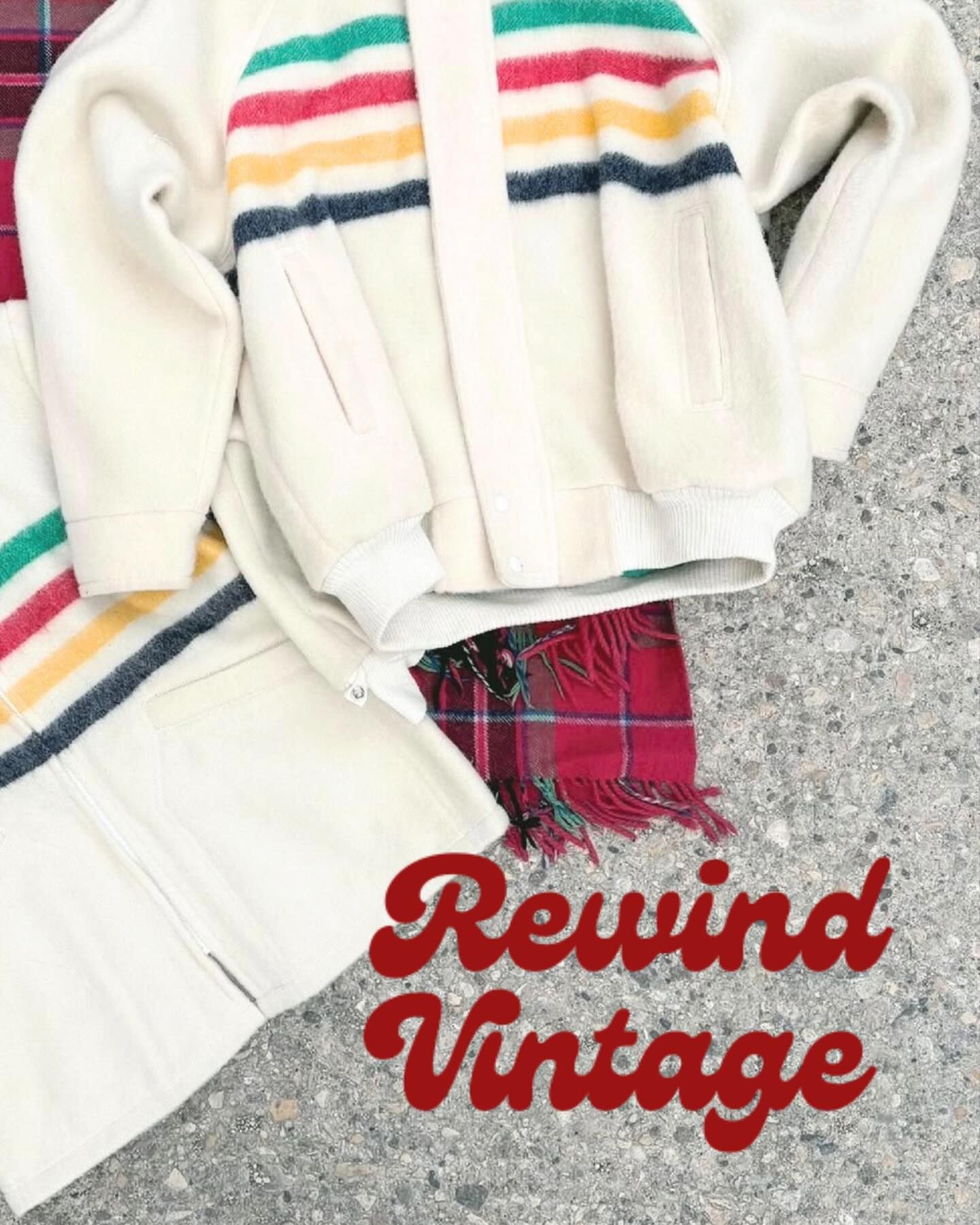 Vintage shopping cart holding red heels, a red knit scarf and a red wallet