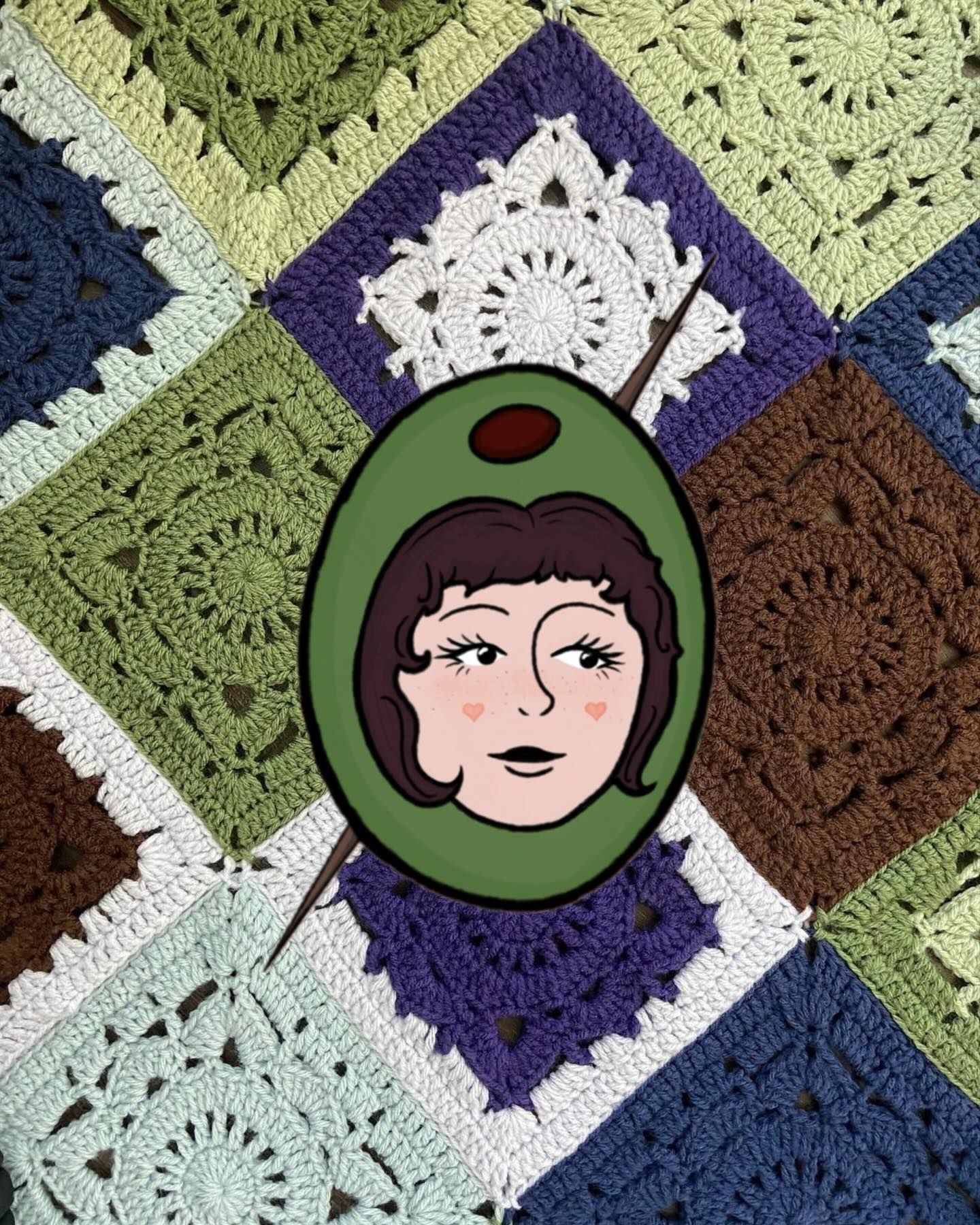 Vintage shopping cart holding red heels, a red knit scarf and a red wallet