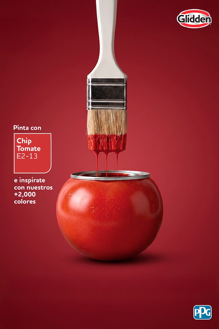 Construction creative ad: Paint brush dripping red paint into a tomato shaped like a paint can