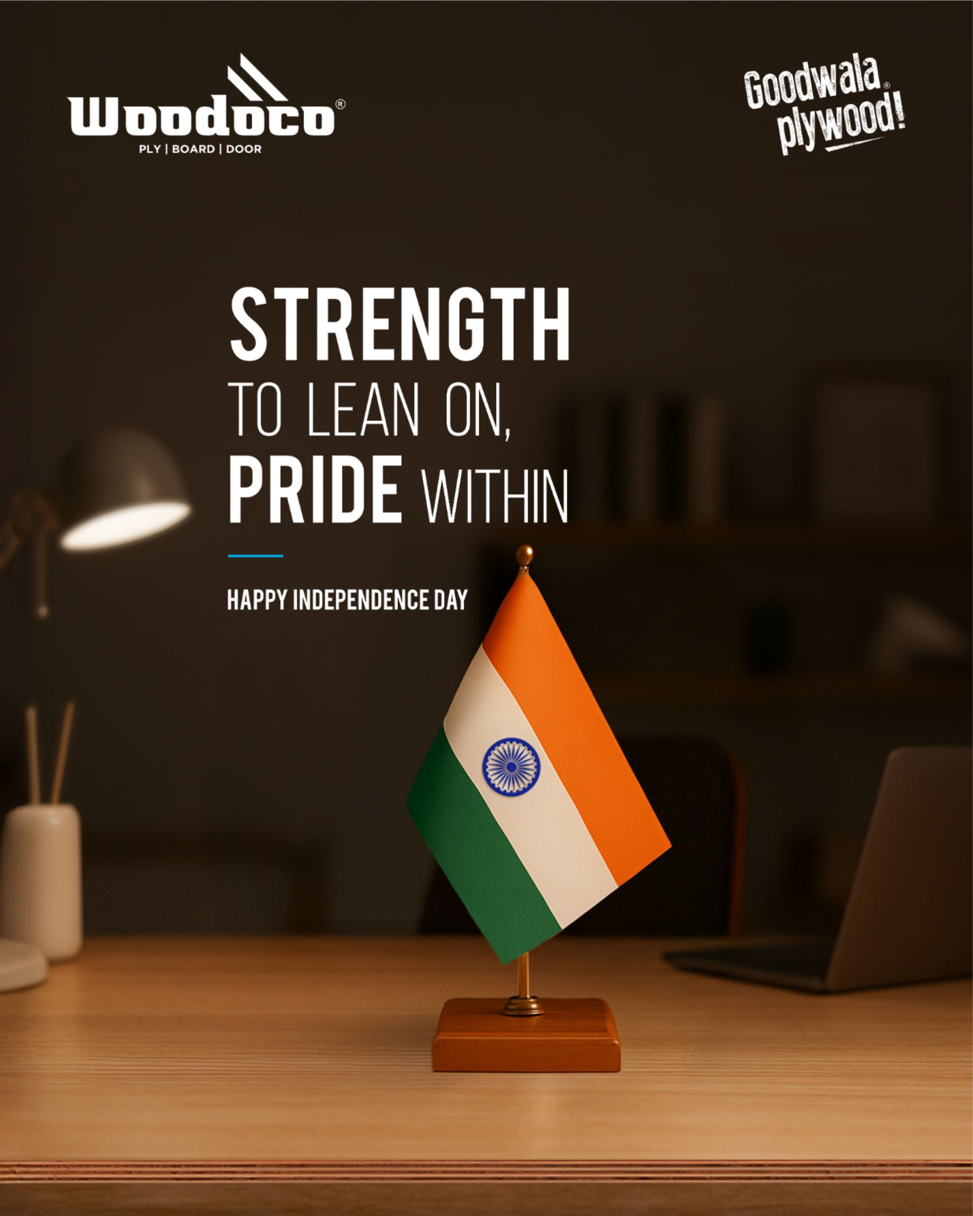 Small tricolour desk flag on a wooden table in a dim study