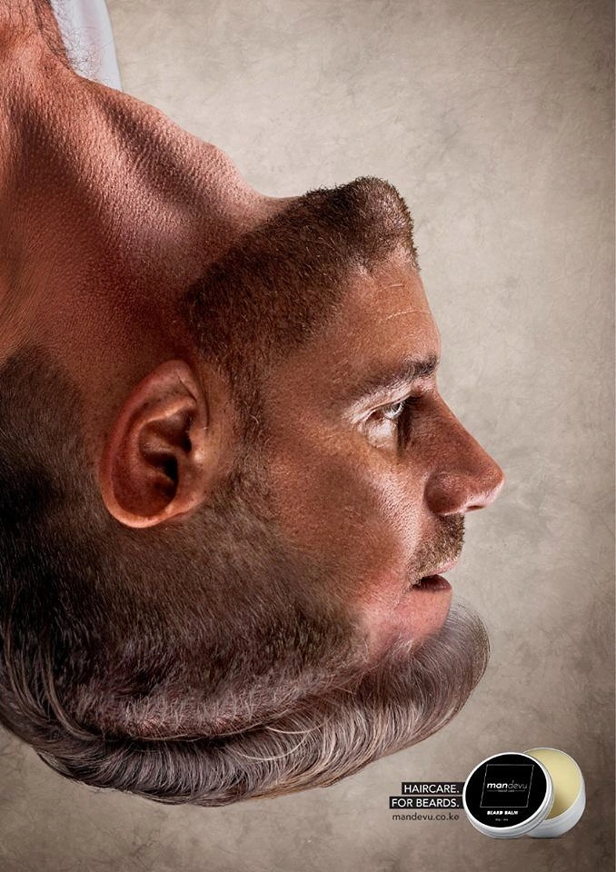 Beauty & Salon creative ad: Inverted bearded man's head whose beard reads as a hairstyle