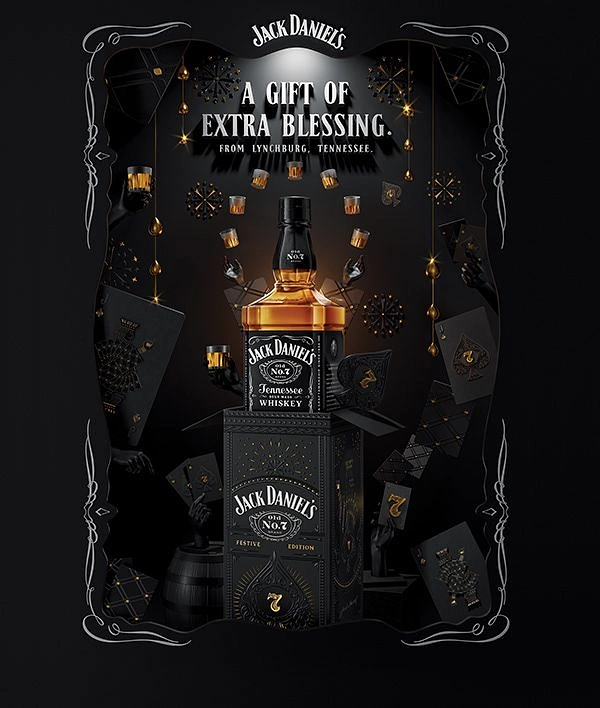 Diwali creative ad: Whiskey bottle on a black festive-edition gift box