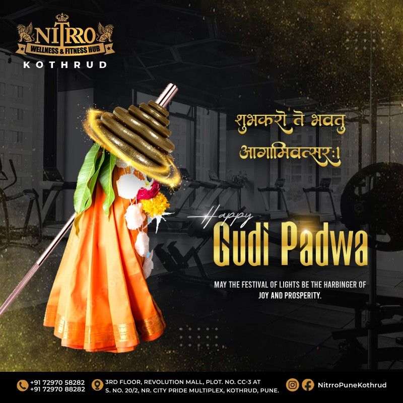 Gudi built from a barbell and stacked weight plates with saffron cloth