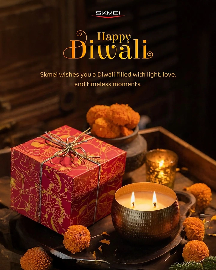 Diwali creative ad: A red floral gift box beside a glowing candle and marigolds
