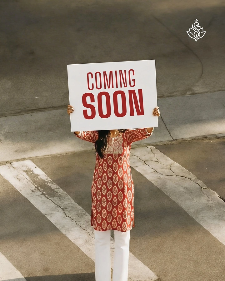 Ethnic Wear & Sarees creative ad: Model holding Coming Soon placard teaser