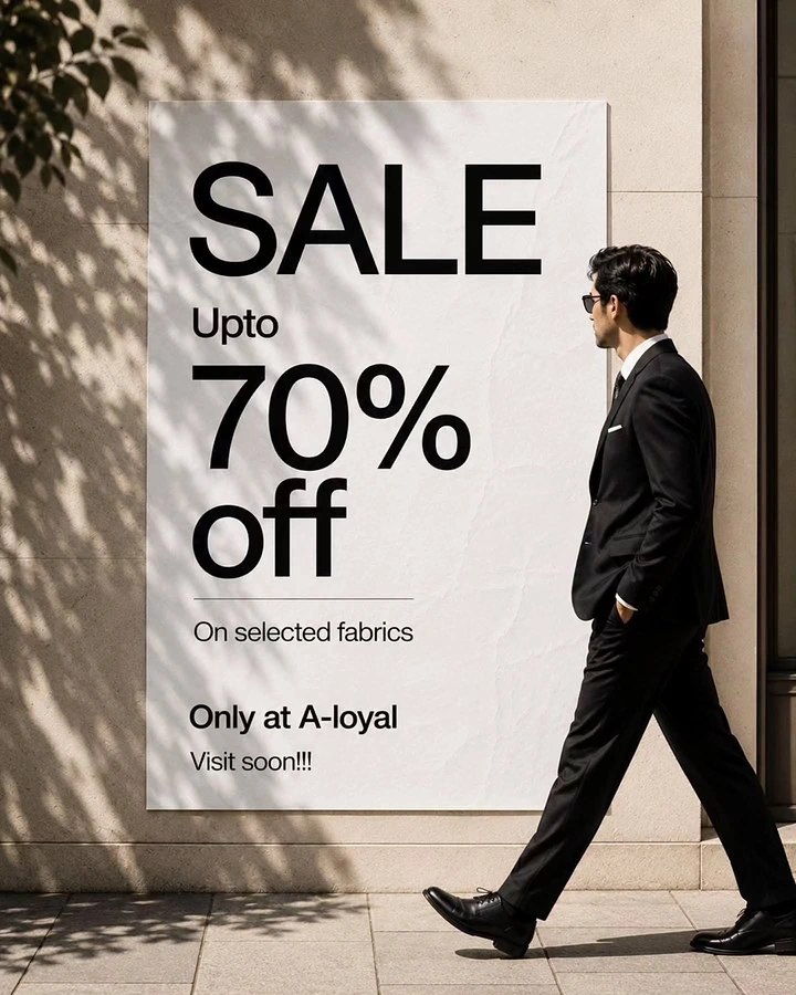 Tailors & Alterations creative ad: Sale poster on street wall, man walking past