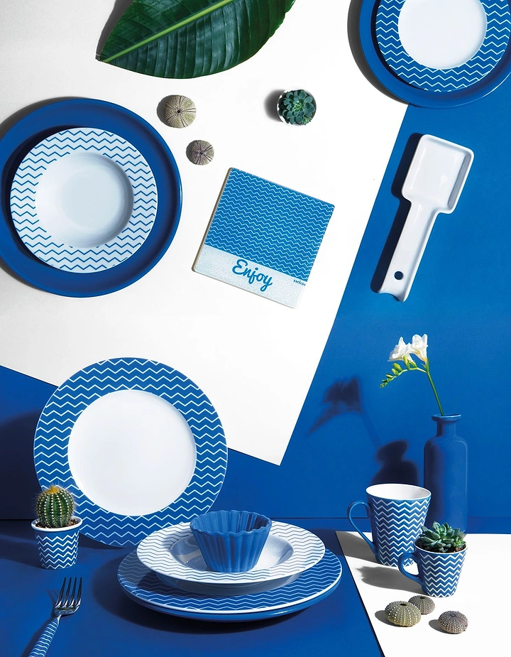 Tableware & Crockery creative ad: Distinctive blue monochrome floating-tableware composition