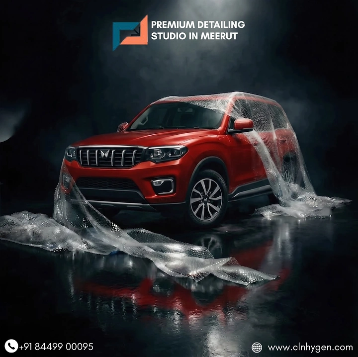 Car Wash & Detailing creative ad: Red SUV unveiled under water-sheet drape