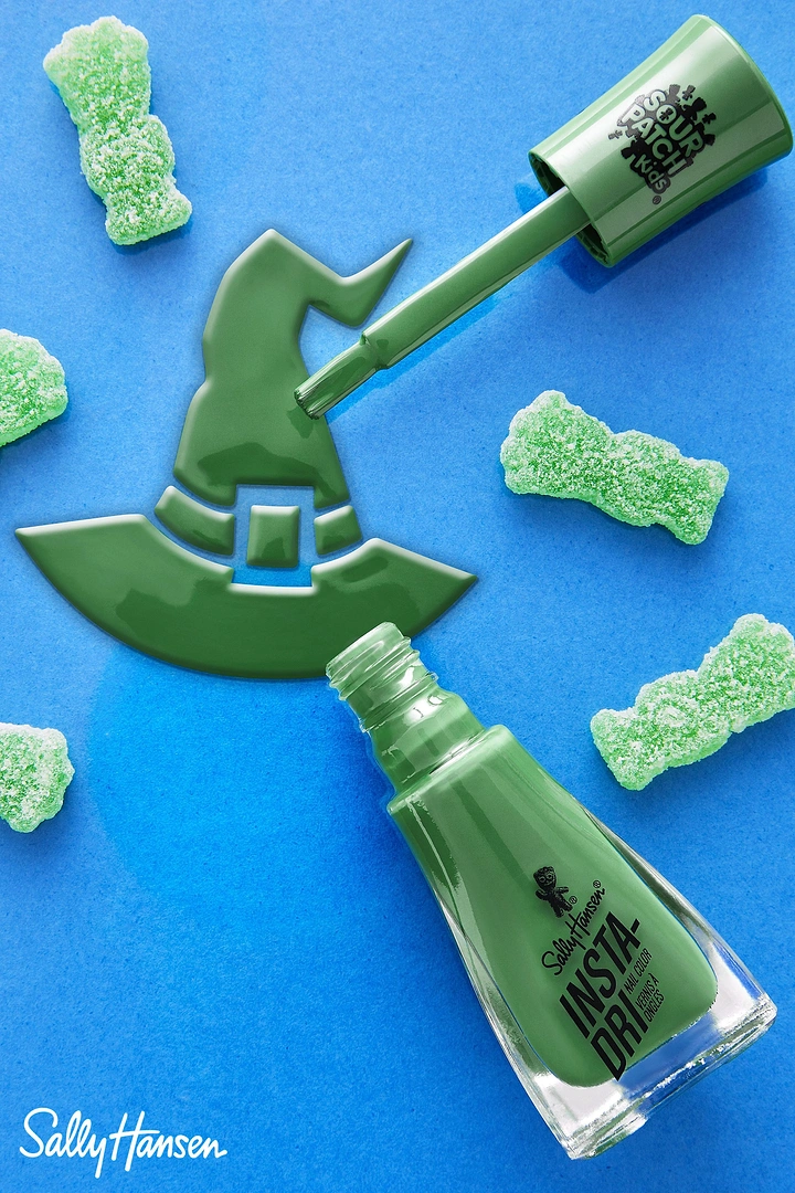 Halloween creative ad: Green nail polish poured into a witch-hat shape