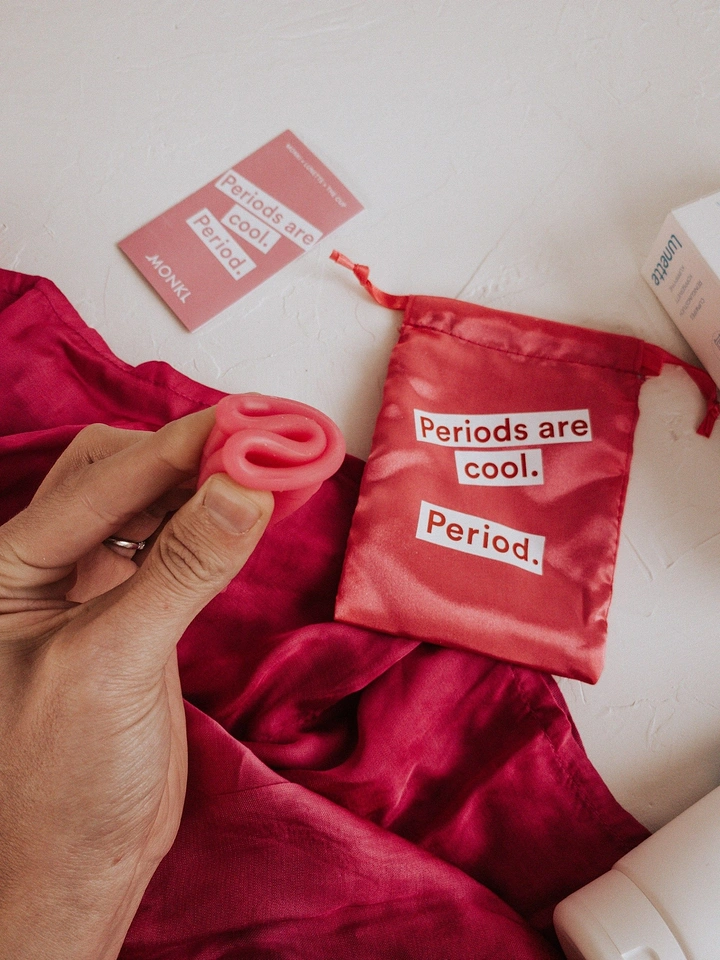 Period Care & Feminine Hygiene creative ad: Styled product scene with playful period copy