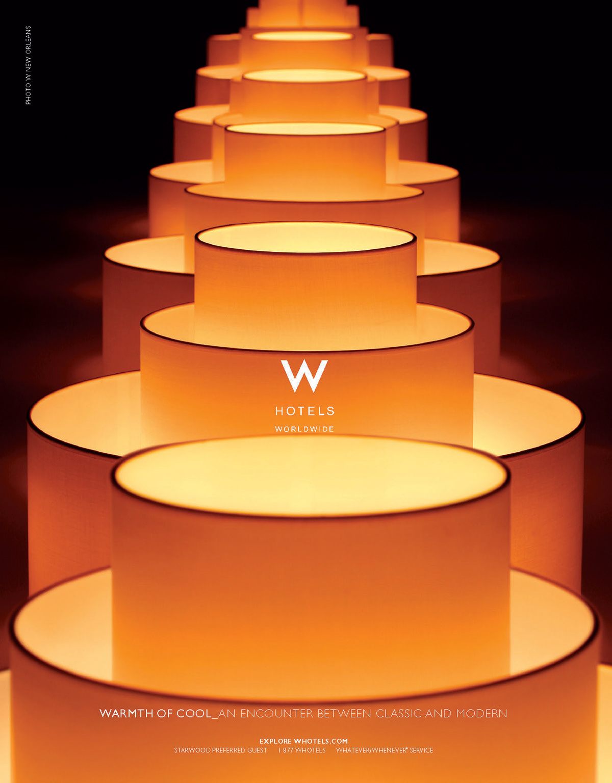 Poster: Receding row of glowing orange drum lampshades