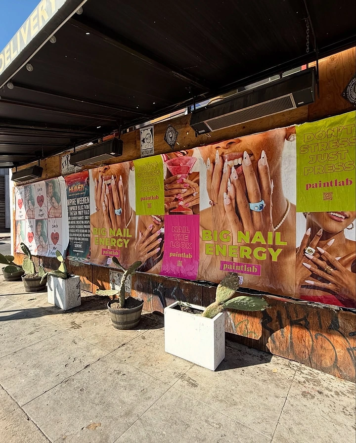 Nail Salons creative ad: Big Nail Energy wheatpaste poster wall