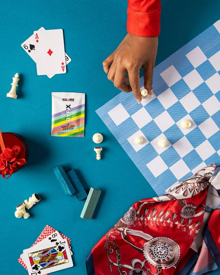 Board Games & Game Cafes creative ad: Unexpected fashion editorial built around games