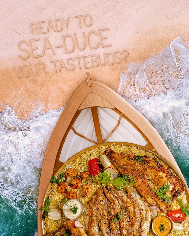 Seafood Restaurants creative ad: Sea-duce pun with beach platter composition