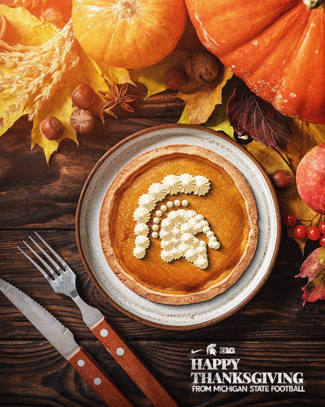 Pumpkin pie with the team logo piped in whipped cream