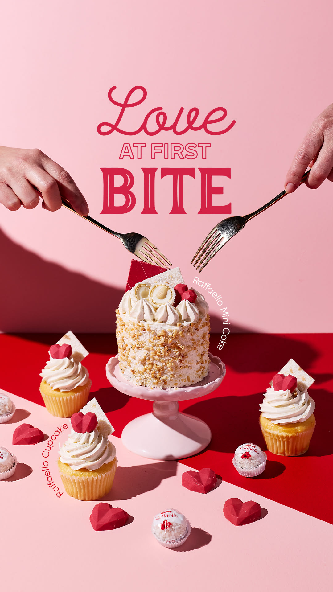 Valentine's Day Story: Mini cake on pink stand with two hands reaching in with forks