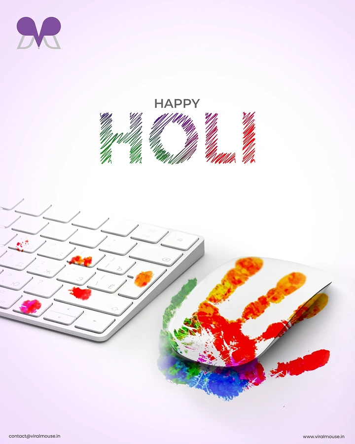 Holi creative ad: White keyboard and mouse stained with Holi colours