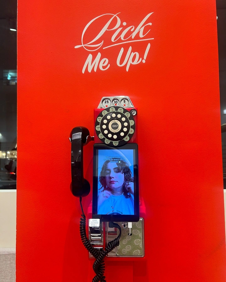 Photo Booth Rentals creative ad: Telephone booth transformed into selfie station