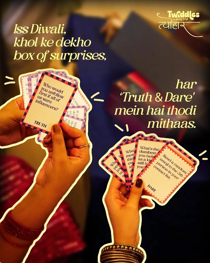 Diwali creative ad: Two cut-out hands fanning truth-and-dare cards