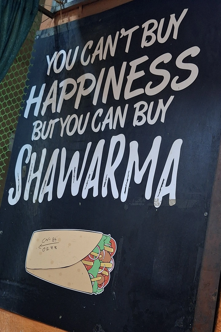 Arabic & Middle Eastern Restaurants creative ad: Witty happiness-and-shawarma copy concept