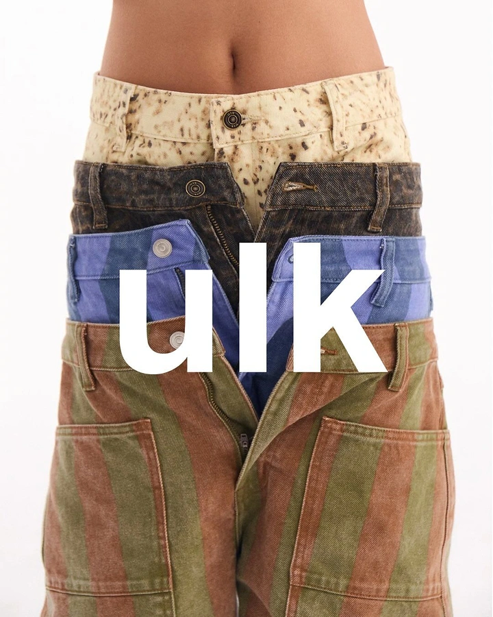 Denim & Jeans Brands creative ad: Unexpected stacked-jeans visual composition