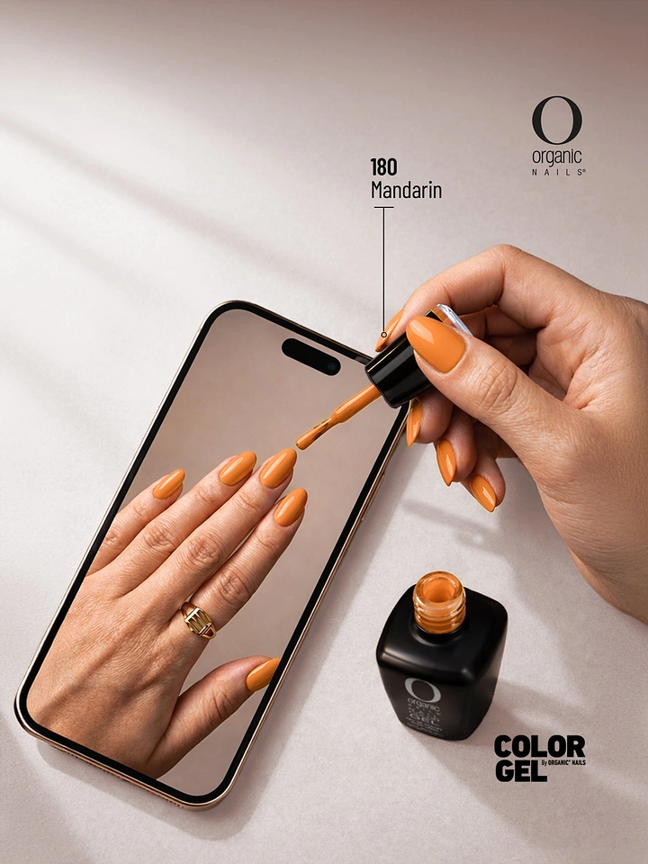 Beauty & Salon creative ad: Hand painting orange nail polish onto a hand shown on a phone screen